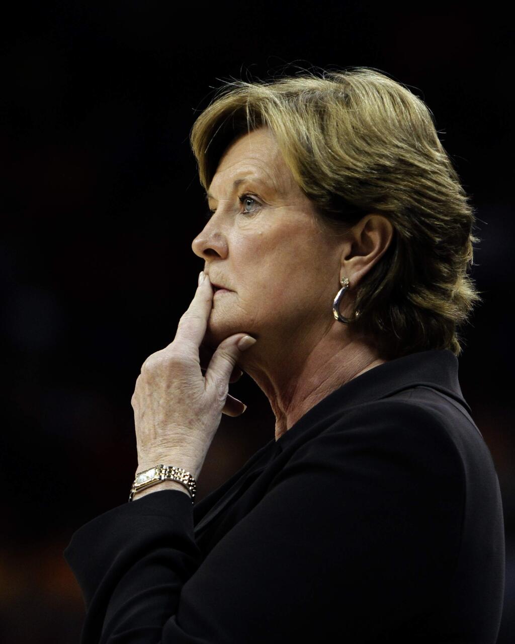 FILE - In this Nov. 12, 2010, file photo, Tennessee coach Pat Summitt watches her team against Louisville in a NCAA college basketball game in Louisville, Ky. Summitt, the winningest coach in Division I college basketball history who uplifted the women's game from obscurity to national prominence during her career at Tennessee, died Tuesday morning, June 28, 2016. She was 64.(AP Photo/Garry Jones, File)