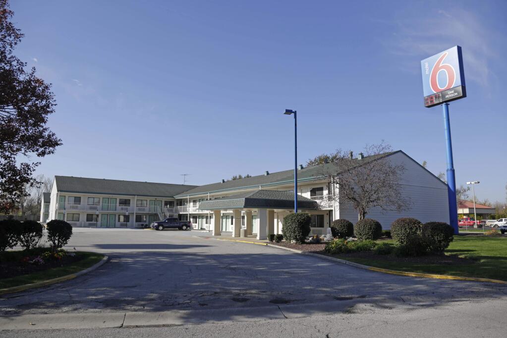 This Motel 6 in Hammond, Ind. seen Monday, Oct. 20, 2014, is where police found one of seven women's bodies the weekend. The bodies of the seven women were found after a man confessed to killing one woman who was found strangled at the motel and lead investigators to at least three other bodies, authorities said Monday. The Lake County coroners office said three of the bodies were found Sunday night at two locations in Gary, while the other four bodies were found earlier over the weekend. (AP Photo/M. Spencer Green)
