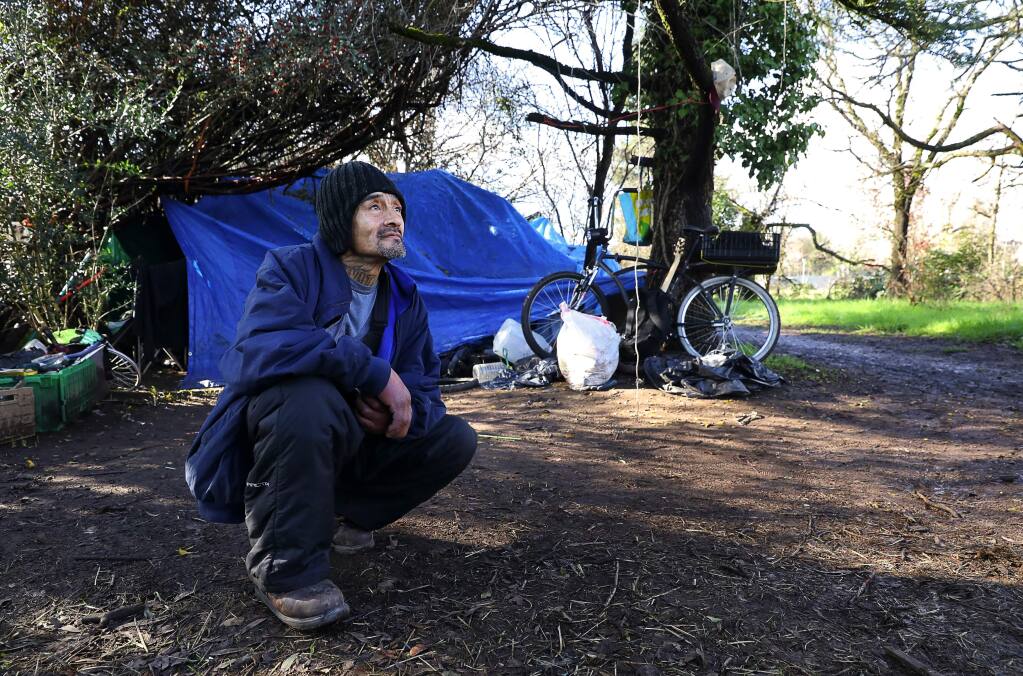 Manuel Santiago has been living in an area of southwest Santa Rosa since Camp Michela, a homeless camp in the Roseland area, was shut down.(Christopher Chung/ The Press Democrat)