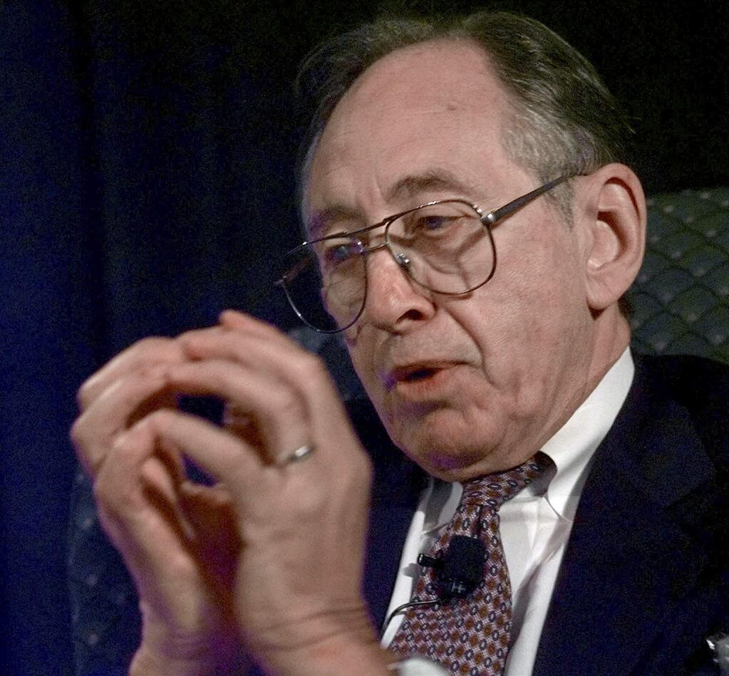 FILE - In this July 20, 1998 file photo, author Alvin Toffler, gestures during his talk on the Fourth Wave at the Astrobiology Roadmap Workshop in Mountain View, Calif. Toffler, a guru of the post-industrial age whose million-selling 'Future Shock' and other books anticipated the disruptions and transformations brought about by the rise of digital technology, has died. He was 87. (AP Photo/Paul Sakuma, File)
