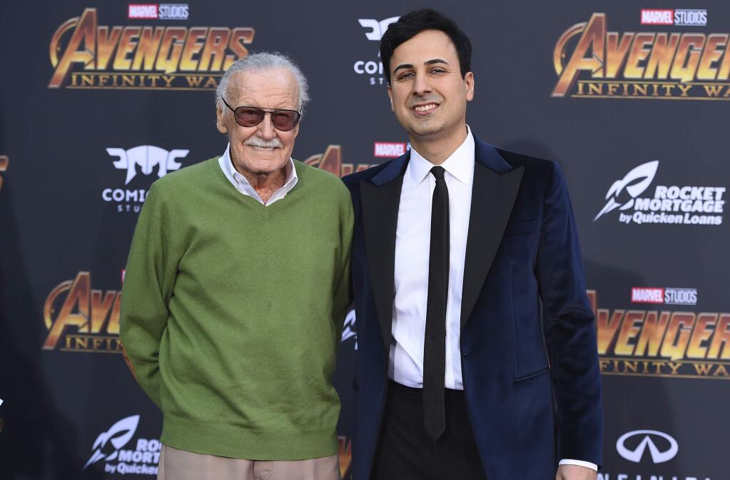 FILE - In this April 23, 2018 file photo, Stan Lee, left, and Keya Morgan arrive at the world premiere of 'Avengers: Infinity War' in Los Angeles. After the death last July of his wife Joan, the Marvel mogul has found himself in the middle of a fight over his finances and properties that has led to lawsuits, a restraining order and a police investigation of elder abuse. (Photo by Jordan Strauss/Invision/AP, File)