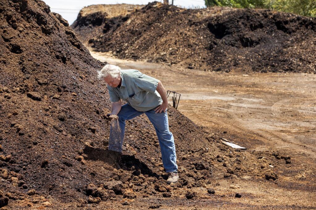 Bob Cannard, owner of Green String Farm in Petaluma, makes tons of his own compost for use on the farm. (John Burgess / The Press Democrat)