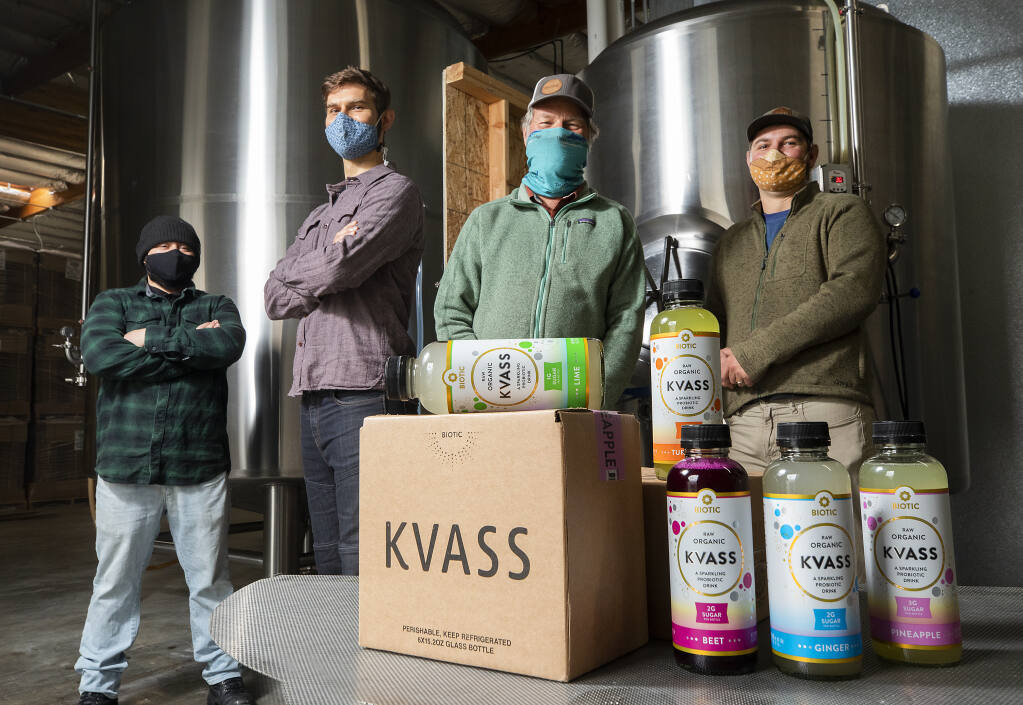 Biotic Brands co-owners, from right, Adam, Michael and Ryan Johnston with Nate de los Santos produce organic Kvass drinks without refined sugars in their Petaluma production facility. Photo taken on Friday, December 11, 2020.  (Photo by John Burgess/The Press Democrat)