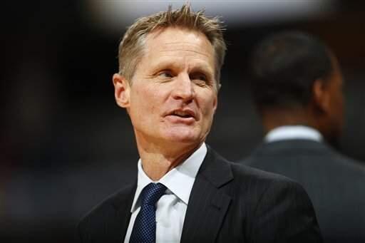 In this Feb. 13, 2017, file photo, Golden State Warriors head coach Steve Kerr looks on in the first half of a game against the Denver Nuggets in Denver. (AP Photo/David Zalubowski, File)