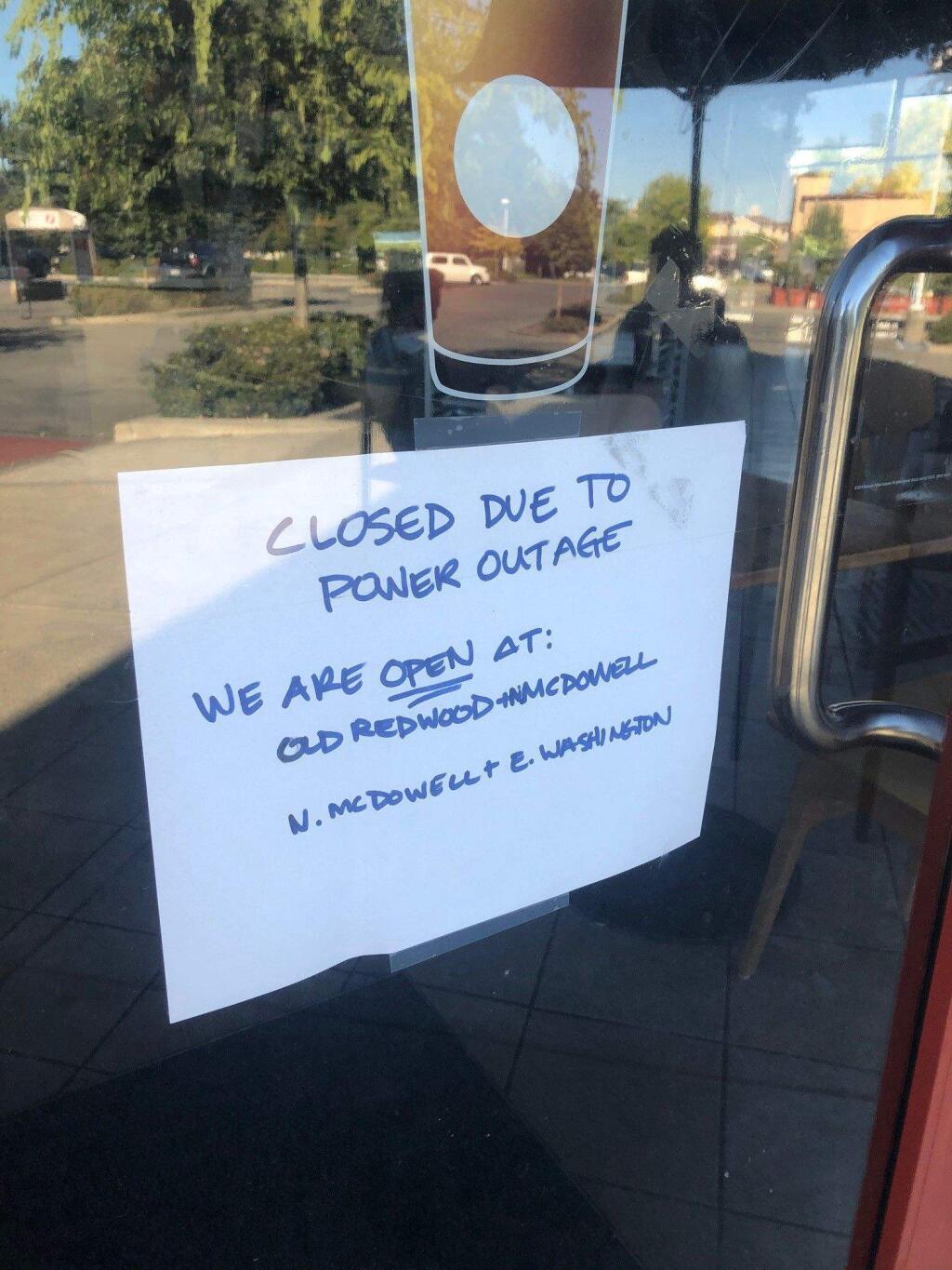 CAFFEINE LETDOWN - A sign in the window at East Petaluma's Leghorn Marketplace Starbucks.