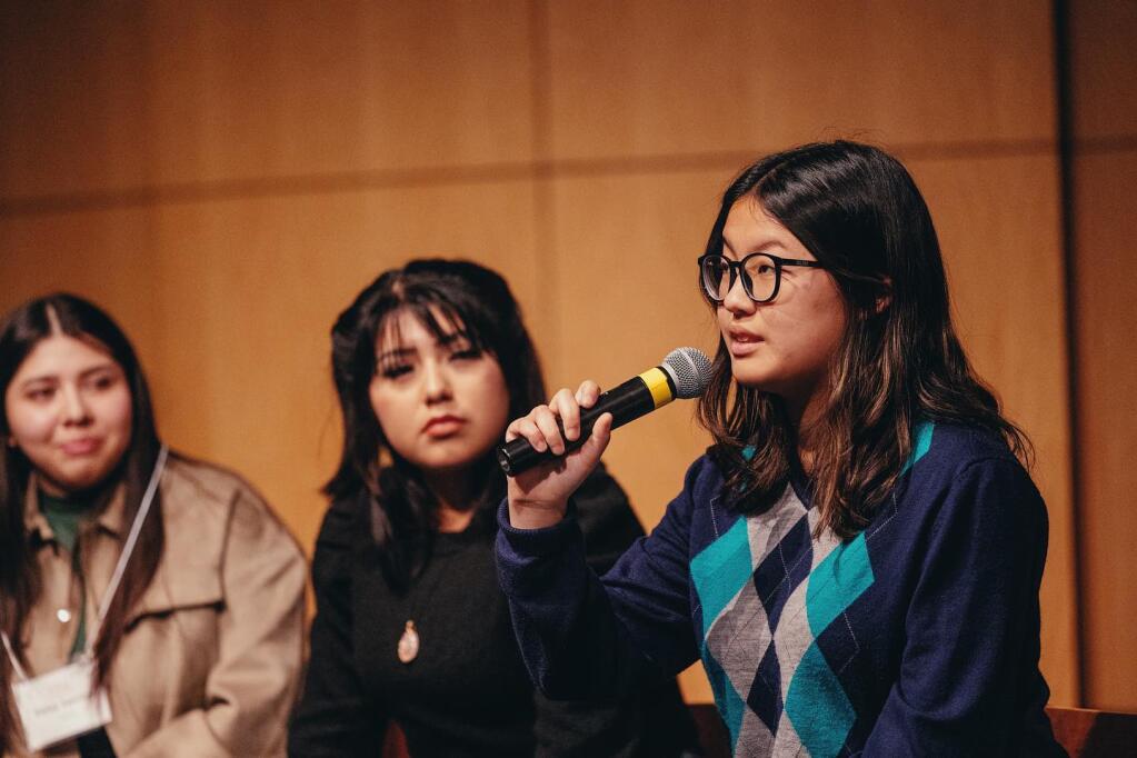 Napa High School student Julia Bui, speaking at the Napa Valley Wellness Conference, is an advocate for mental health services for her peers. (Courtesy: Mario Piombo, Aperture Media)