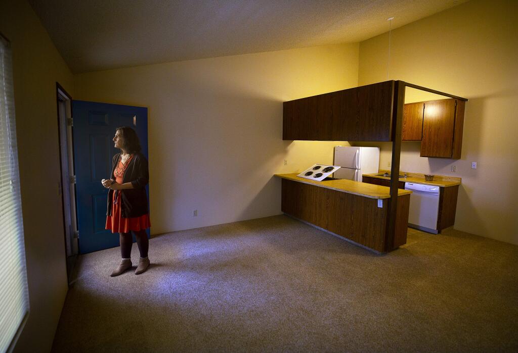 Manager Nancy Brown shows one of the in the Coddingtown Mall Apartments in Santa Rosa. (photo by John Burgess/The Press Democrat)