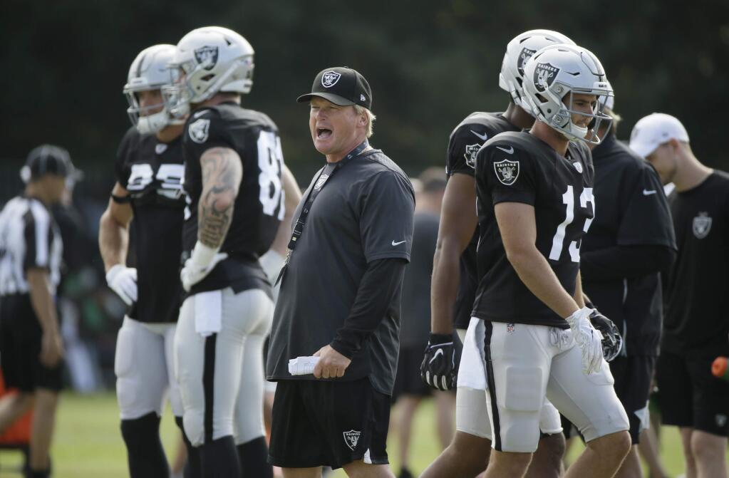 Oakland Raiders head coach Jon Gruden yells during NFL football training camp Wednesday, Aug. 7, 2019, in Napa, Calif. Both the Oakland Raiders and the Los Angeles Rams held a joint practice before their upcoming preseason game on Saturday. (AP Photo/Eric Risberg)