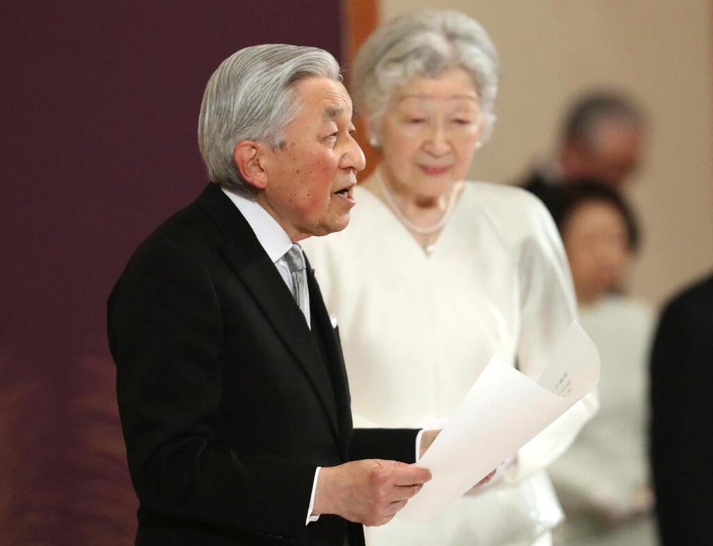 Japan's Emperor Akihito, accompanied by Empress Michiko, speaks during the ceremony of his abdication in front of other members of the royal families and top government officials at the Imperial Palace in Tokyo, Tuesday, April 30, 2019. The 85-year-old Akihito ends his three-decade reign on Tuesday as his son Crown Prince Naruhito will ascend the Chrysanthemum throne on Wednesday. (Japan Pool via AP)