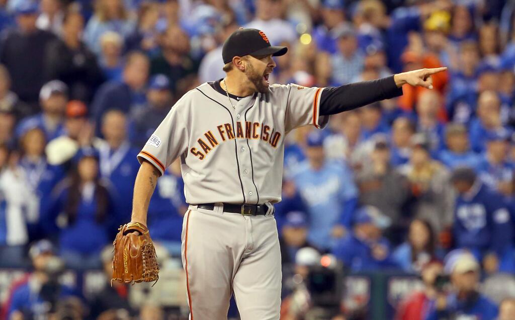 Giants pitcher Jeremy Affeldt calls for a review of a double play in the third inning during Game 7 of the World Series in Kansas City, Wednesday, Oct. 29, 2014. (Christopher Chung / Press Democrat)