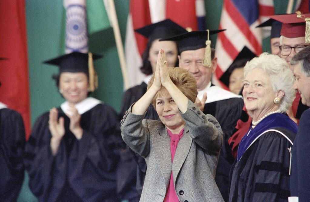 First Lady Barbara Bush and Soviet First Lady Raisa Gorbachev respond to the crowd and graduating class as they take the stage at Wellesley College in 1990. (ELISE AMENDOLA / Associated Press, 1990)