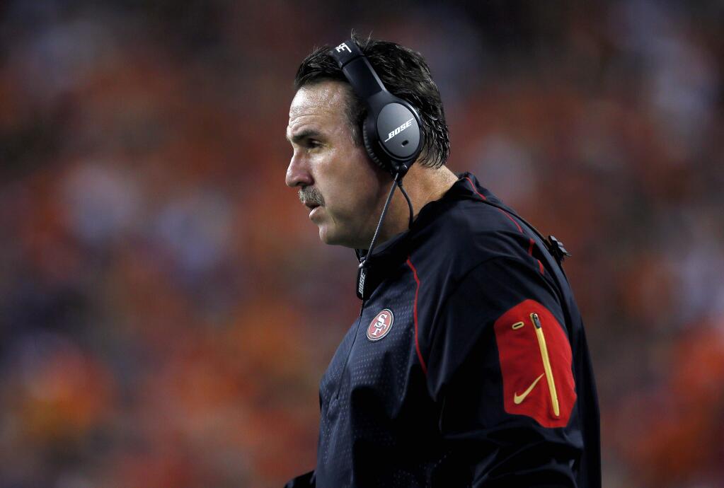 San Francisco 49ers coach Jim Tomsula stands on the sideline during the first half of an NFL preseason football game against the Denver Broncos, Saturday, Aug. 29, 2015, in Denver. (AP Photo/Joe Mahoney)