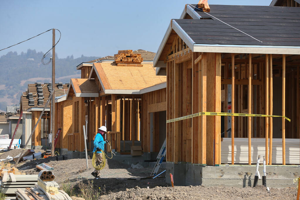 Single family homes under construction along Kristina Place, at Kingwood Road, in Rohnert Park on Thursday, Sept. 2, 2021.  (Christopher Chung/ The Press Democrat)