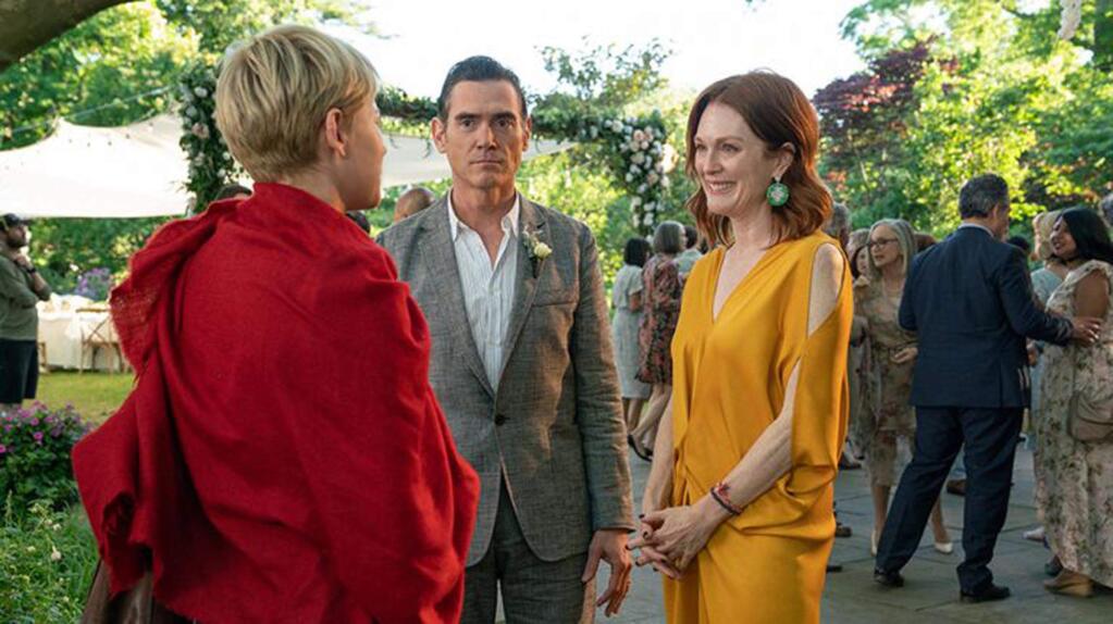 Charity worker Isabel (Michelle Williams, left) working with children in an orphanage in Calcutta gets a mysterious grant from Theresa (Julianne Moore, right) the multimillionaire head of a media company who lives with her artist husband (Billy Crudup)r in 'After the Wedding.' (Sony Pictures Classics)