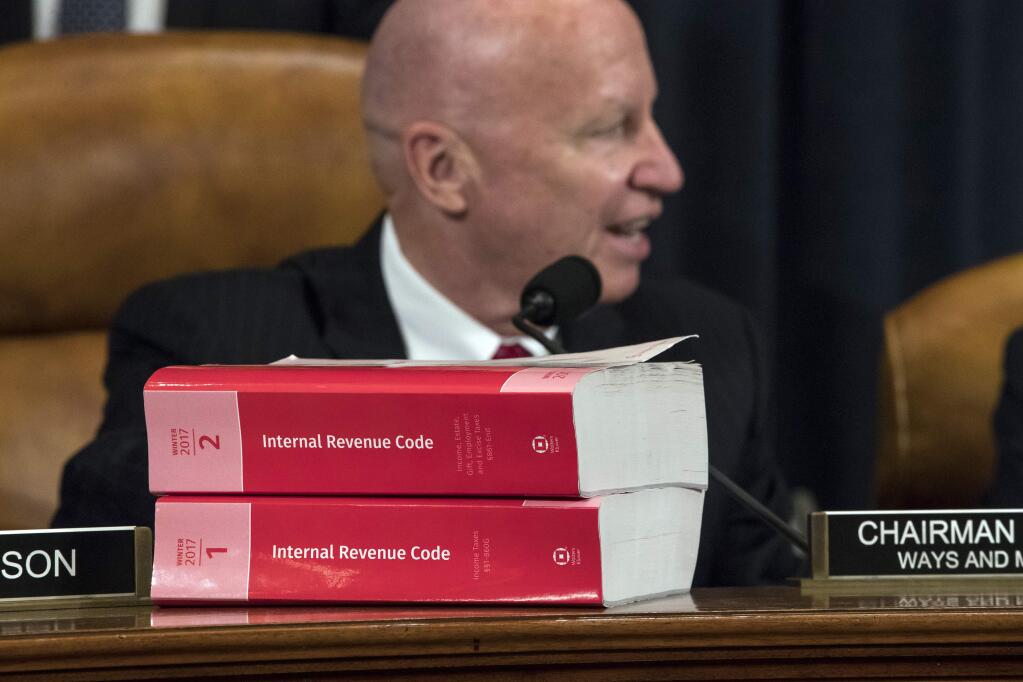 House Ways and Means Committee Chairman Kevin Brady, R-Texas, begins the markup process of the GOP's far-reaching tax overhaul as members propose amendments and changes to shape the first major revamp of the tax system in three decades, on Capitol Hill in Washington, Monday, Nov. 6, 2017. (AP Photo/J. Scott Applewhite)