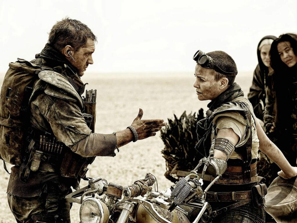 Warner Bros.Mad Max (Tom Hardy) joins forces with Furiosa (Charlize Theron) against a warlord in 'Mad Max: Fury Road,' the first installment of the series in 25 years.