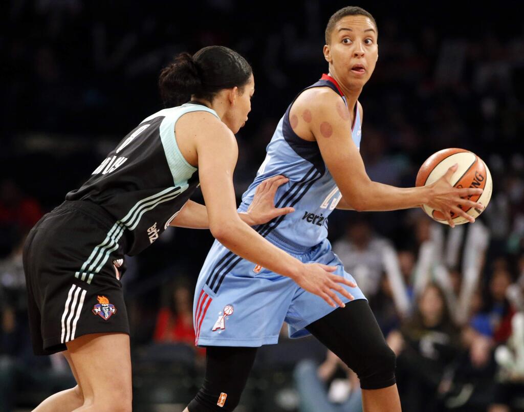 In this Wednesday, June 7, 2017 photo, Atlanta Dream guard Layshia Clarendon (23) looks to pass during an WNBA basketball game against the New York Liberty in New York. Former California women's basketball player and current WNBA guard Layshia Clarendon has filed a lawsuit against Cal claiming she was sexually assaulted by a longtime member of the athletic department. The school acknowledged the lawsuit Wednesday night, Jan. 17, 2018 and said the staff member, Mohamed Muqtar, had recently been placed on paid leave. (AP Photo/Kathy Willens, File)