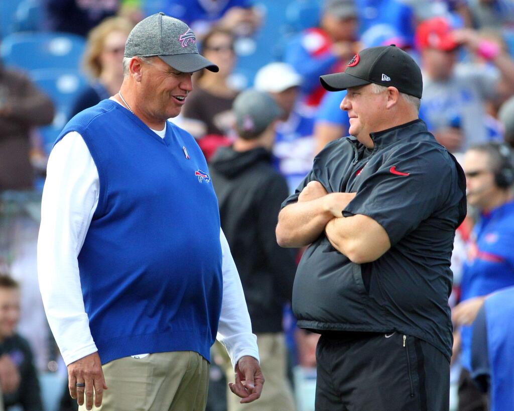 Buffalo Bills coach Rex Ryan, left, and 49ers coach Chip Kelly talk before an NFL football game on Sunday, Oct. 16, 2016. (Bill Wippert / Associated Press)