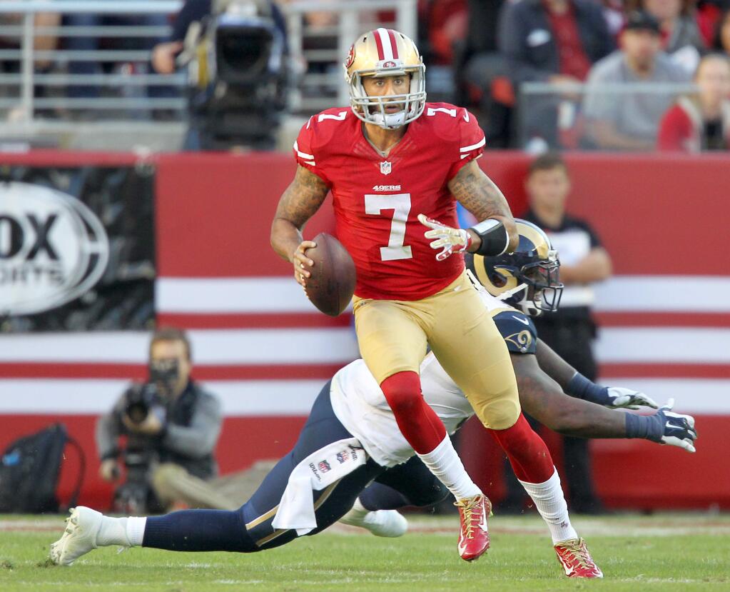 San Francisco 49ers starting quarterback Colin Kaepernick got rid of the ball in 2.68 seconds last season on average and was sacked 52 times. In contrast, Peyton Manning got rid of the ball in 2.22 seconds on average and was sacked 17 times. (Photo by John Burgess, The Press Democrat)