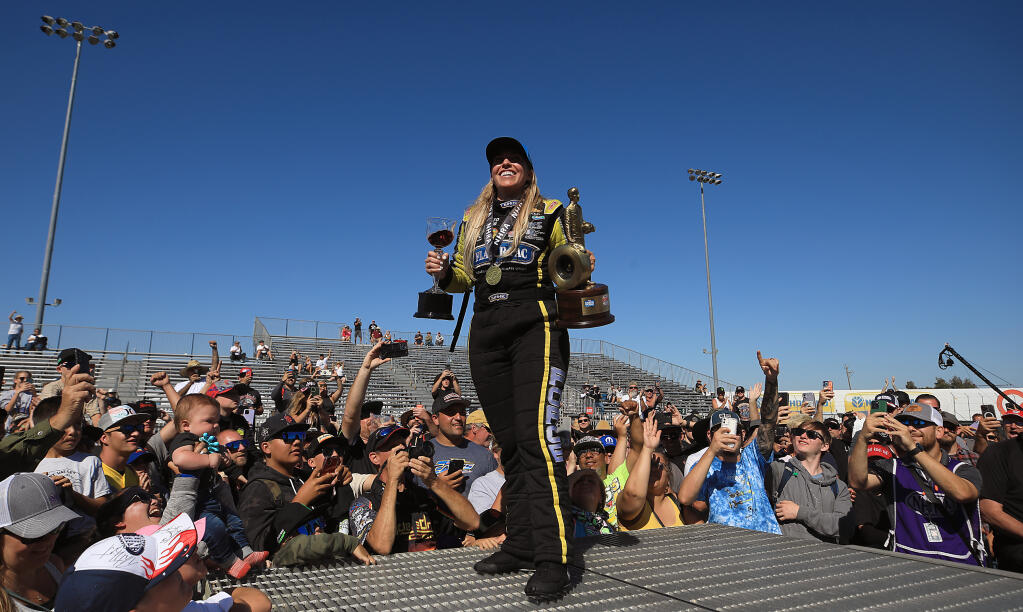 Brittany Force celebrates her victory at the Denso NHRA Sonoma Nationals, Sunday, July 24, 2022 in Sonoma. Force was victorious at Sonoma Raceway for the first time in her career.  (Kent Porter / The Press Democrat) 2022