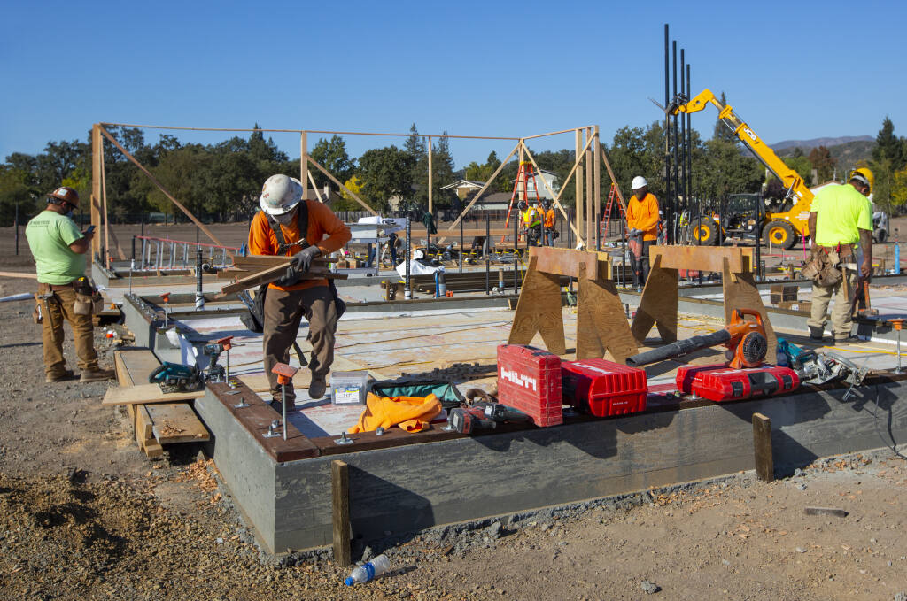 Some, but not all, of the workers building the sports complex at the Sonoma Valley High School are union laborers. (Photo by Robbi Pengelly/Index-Tribune)