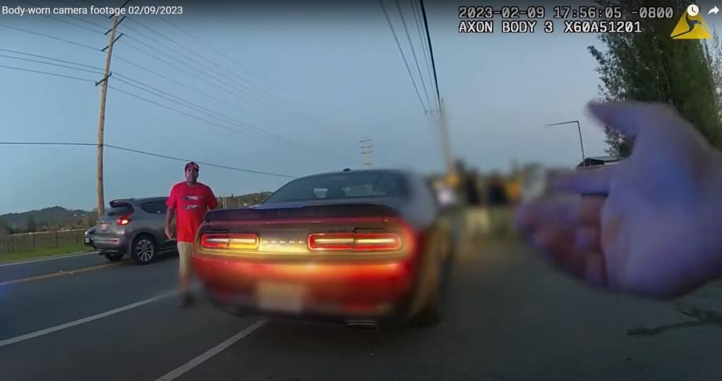 A screenshot from a Sonoma County Sheriff deputy’s body-worn camera video of a traffic stop involving a man who recently reached a $1.3 million settlement after being mauled by a sheriff’s dog in a 2020 arrest. (Sonoma County Sheriff/YouTube)