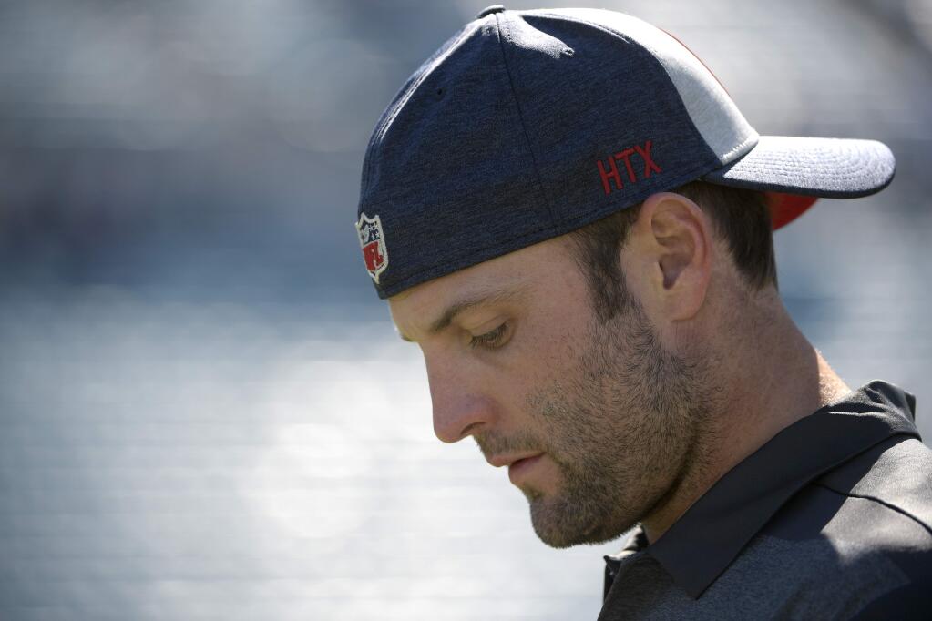 Houston Texans offensive/special teams assistant coach Wes Welker watches warmups before a game against the Jacksonville Jaguars Sunday, Oct. 21, 2018, in Jacksonville, Fla. (AP Photo/Phelan M. Ebenhack)