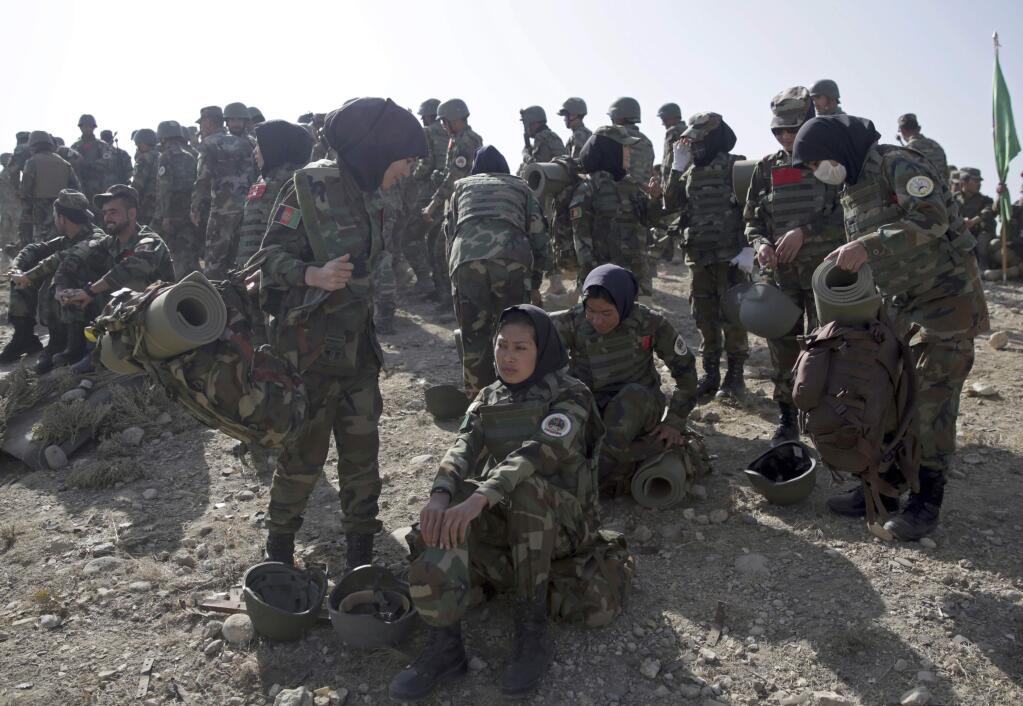 Female and male Afghan National Amy soldiers take part in a military exercise in Kabul, Afghanistan, Tuesday, Oct. 17, 2017. (AP Photo/Massoud Hossaini)