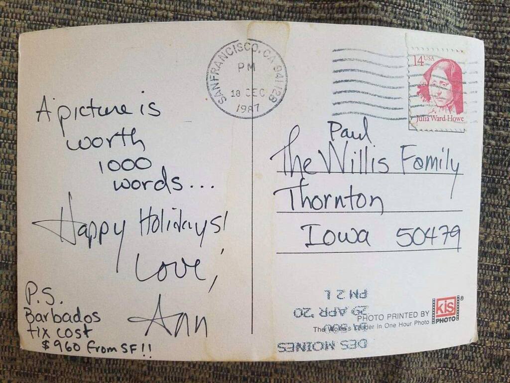 Annie Lovell's holiday postcared to her brother bears postmarks from both 1987 and this past April 29. Lovell mentioned possible travel to Barbados because her brother had worked there for a time, teaching sustainable hog-farmer practices. (Annie Lovell)