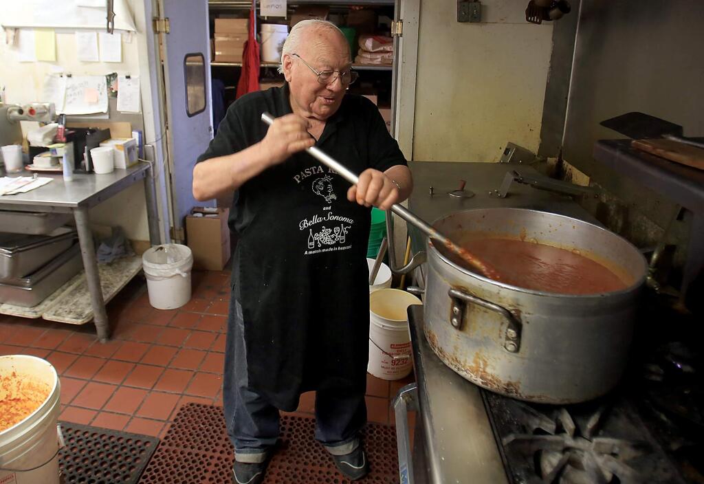 Art Ibleto stirs marinara sauce at the Pasta King's kitchen in Cotati on Thursday, Sept. 22, 2016. (KENT PORTER/ PD FILE)