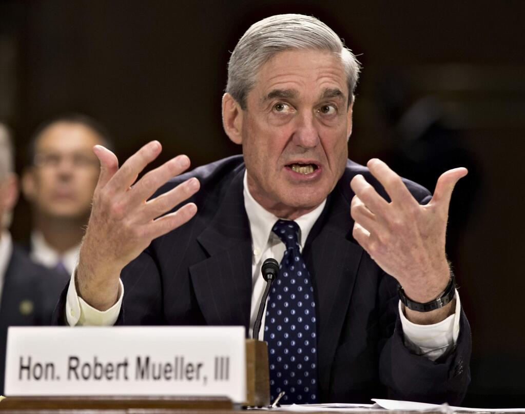 Fomer FBI chief Robert Mueller, seen testifying on Capitol Hill in 2013, was appointed special counsel to investigate possible links between the Trump campaign and Russian efforts to influence last year's presidential election. (J. SCOTT APPLEWHITE / Associated Press)