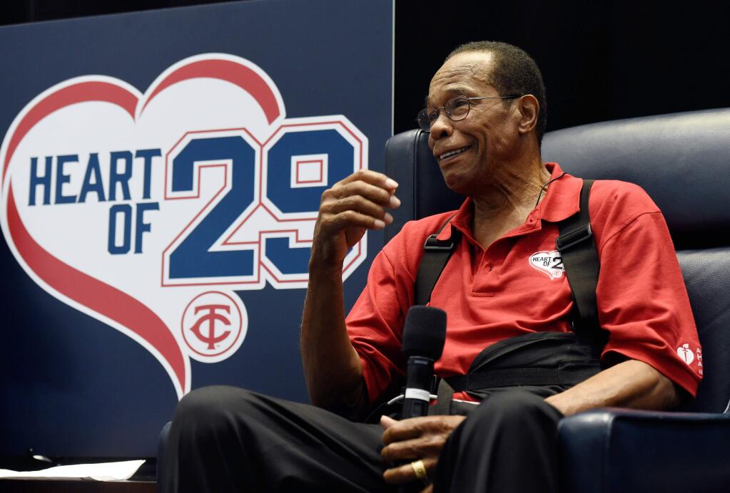 In this Jan. 30, 2016 file photo, Hall of Famer and former Minnesota Twins baseball player Rod Carew speaks to fans about his recent heart attack during TwinsFest in Minneapolis. (AP Photo/Hannah Foslien)