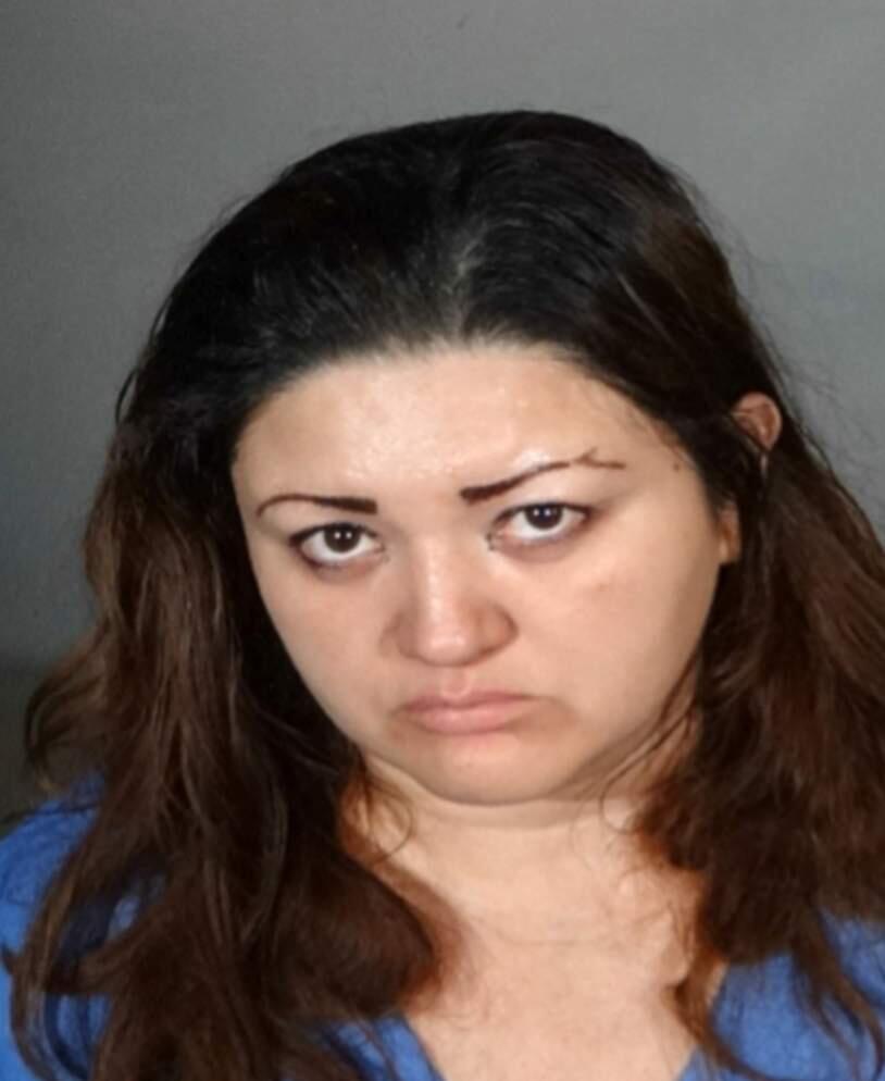 This undated law enforcement booking photo provided by the Los Angeles Police Department shows Veronica Aguilar, 39. Aguilar has been charged with murder in the death of her severely malnourished 11-year-old son Yonatan, whose body was found wrapped in a blanket in a closet in their Los Angeles home Monday, Aug. 22, 2016. Aguilar was charged Thursday, Aug. 25, with one count each of murder and child abuse in the death of her son. (Los Angeles Police Department via AP)