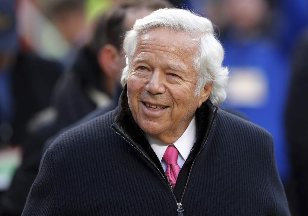 FILE - In this Jan. 20, 2019, file photo, New England Patriots owner Robert Kraft walks on the field before the AFC Championship NFL football game in Kansas City, Mo. The illicit massage parlor sting in Florida that ensnared Kraft is a reminder of how challenging it's been to crackdown on underground prostitution operations. (AP Photo/Charlie Neibergall, File)