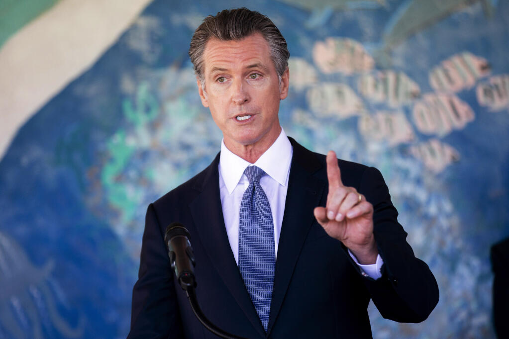 FILE —in this Aug. 11, 2021 file photo California Gov. Gavin Newsom speaks during a news conference at the Carl B. Munck Elementary School in Oakland, Calif. (Santiago Mejia/San Francisco Chronicle via AP, Pool, File)