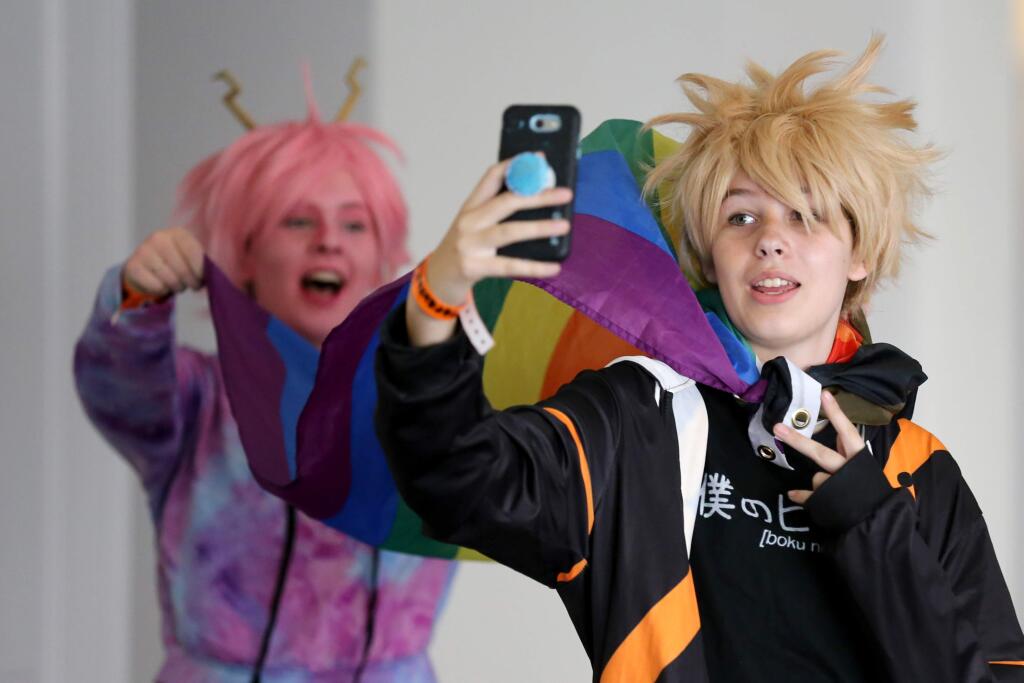 Zoey Garcia, 14, front, and Emma Todhunter, 15, dressed as anime characters attend the Santa Rosa Comic Con at the Hyatt Regency Sonoma Wine Country in Santa Rosa, California on Sunday, October 20, 2019. (BETH SCHLANKER/The Press Democrat)
