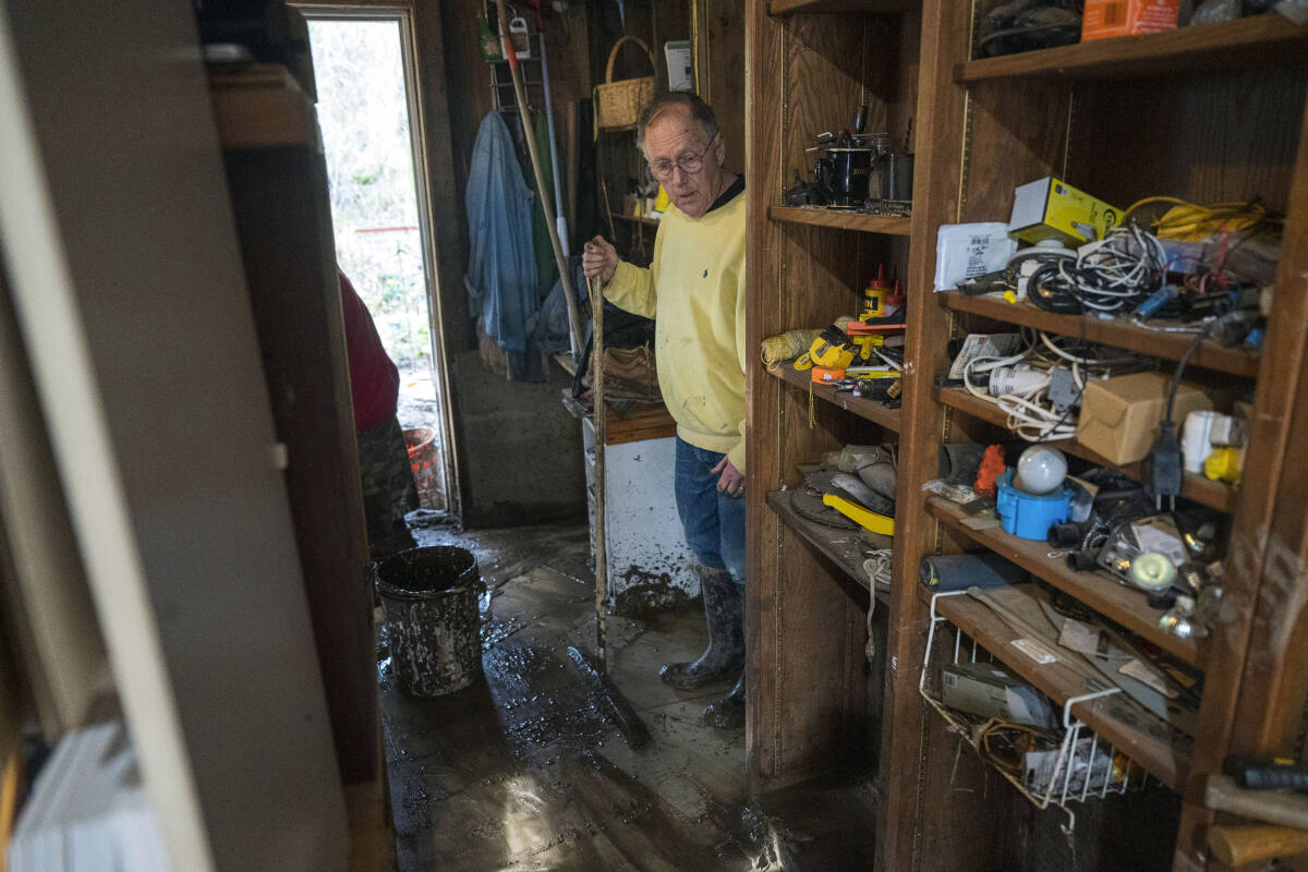 Landslides, sinkholes, floodwaters plague soggy California