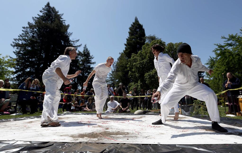 The Imaginists from left to right Brent Lindsay, James Malek, Rae Quintana and Sergio Zavala participated in the 'Circle for Peace,' Painting Performance with Mario Uribe during the Matsuri Japanese Arts Festival held at Juilliard Park, Saturday, May 2, 2015. (CRISTA JEREMIASON / The Press Democrat)