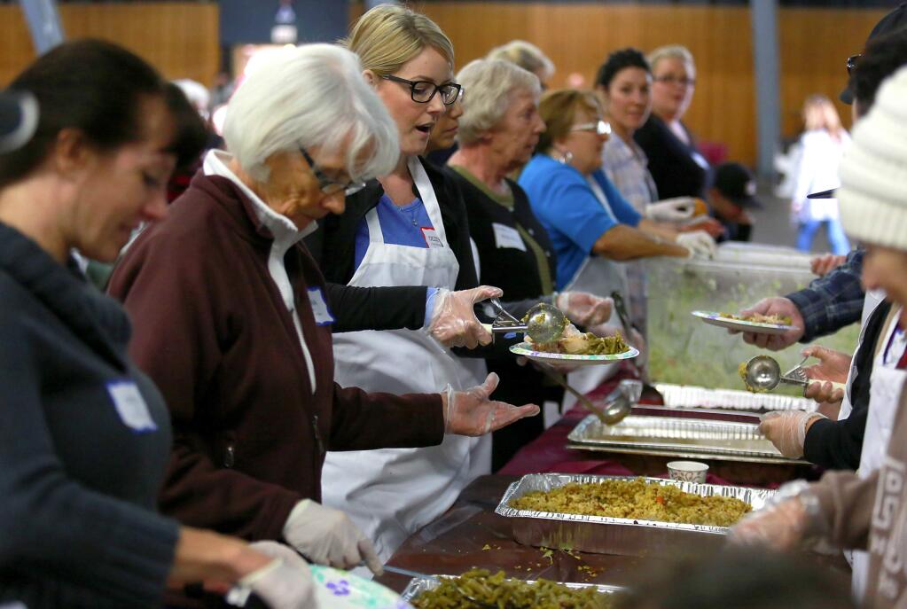 One of the ways people are celebrating Thanksgiving differently this year after recent fires is through serving free meals at Thanksgiving events. (JOHN BURGESS / PD FILE)