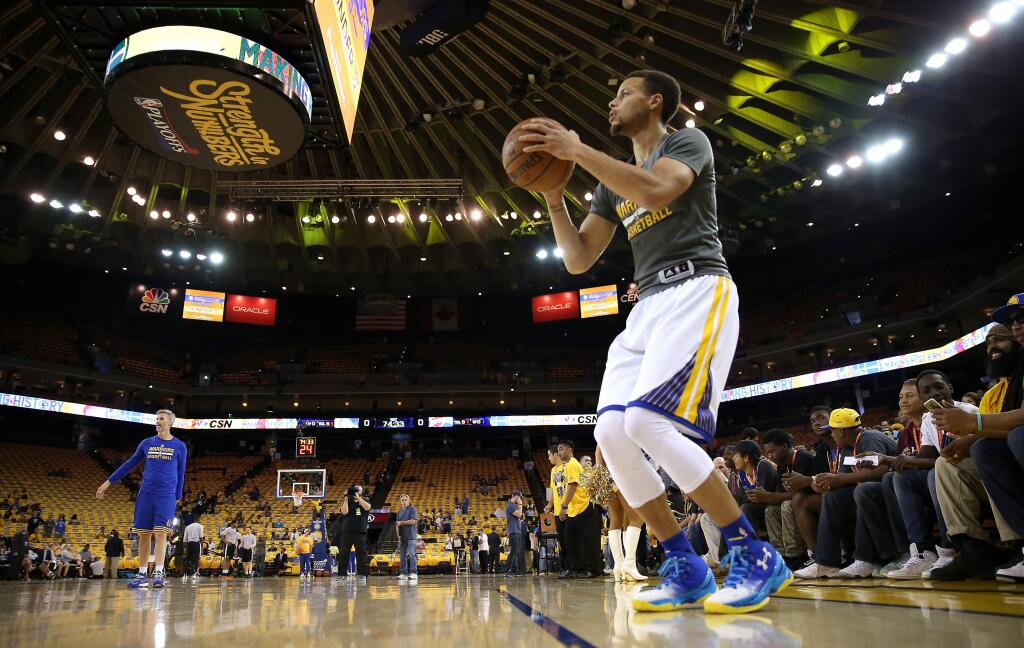 Golden State Warriors' Stephen Curry warms up before the Western Conference Finals Game 7 against the Oklahoma City Thunder in Oakland on Monday, May 30, 2016. (Christopher Chung/ The Press Democrat)