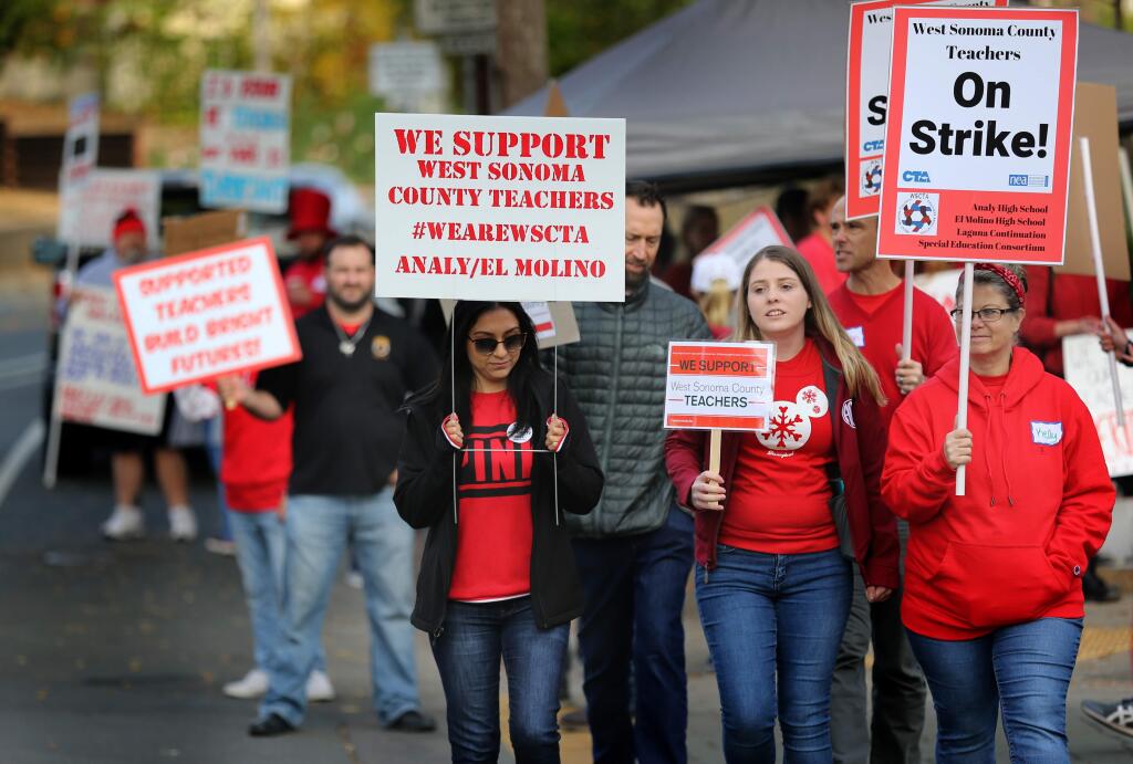 Teachers, school staff, union members and students take part in a West Sonoma County Union High School District teachers strike outside Analy High School in Sebastopol on Wednesday, Nov. 13, 2019. (BETH SCHLANKER/ PD)