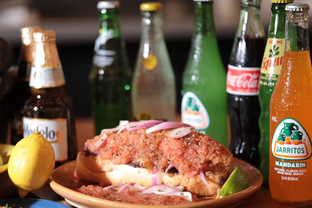 Known as a hangover cure, the torta ahogada is full of flavor. (Courtesy of Tortilla Real)