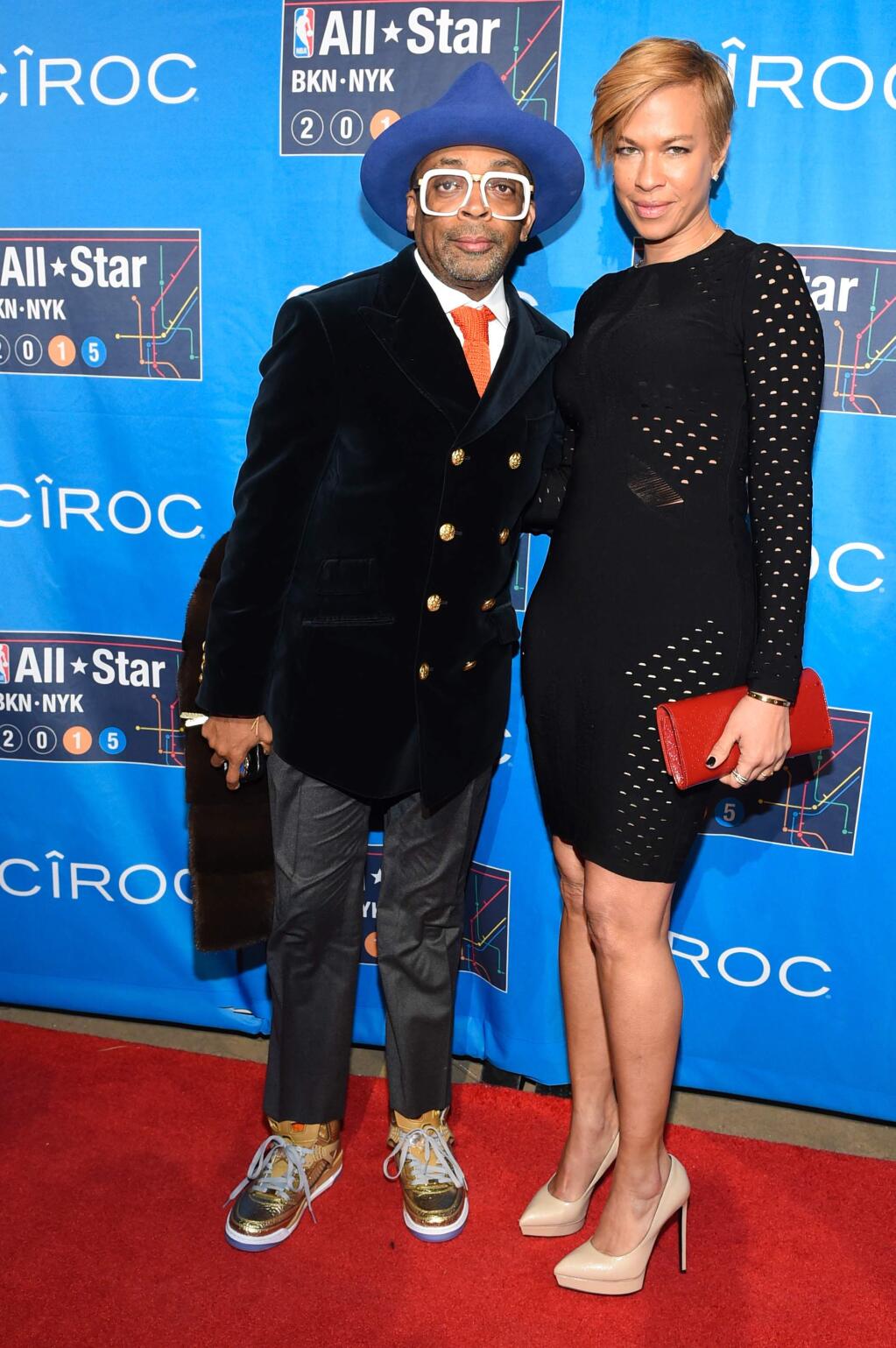 Director Spike Lee, left, and wife Tonya Lewis Lee attend the 2015 NBA All-Star Game at Madison Square Garden on Sunday, Feb. 15, 2015, in New York. (Photo by Scott Roth/Invision/AP)