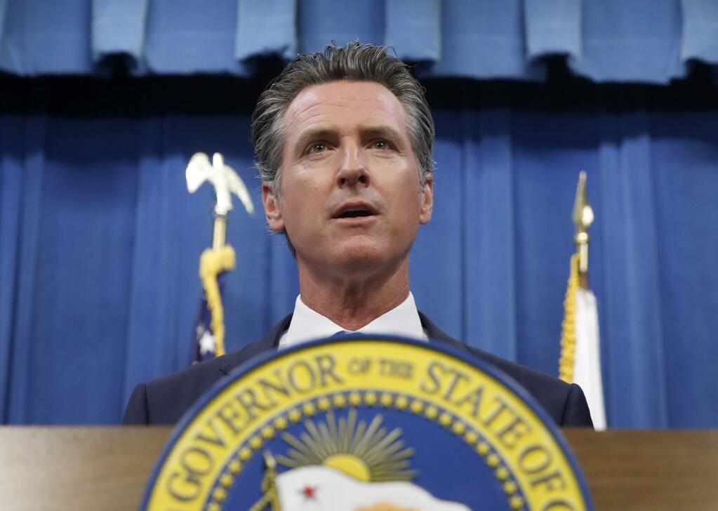 FILE -- In this July 23, 2019 file photo is California Gov. Gavin Newsom during a news conference in Sacramento, Calif. (AP Photo/Rich Pedroncelli, File)