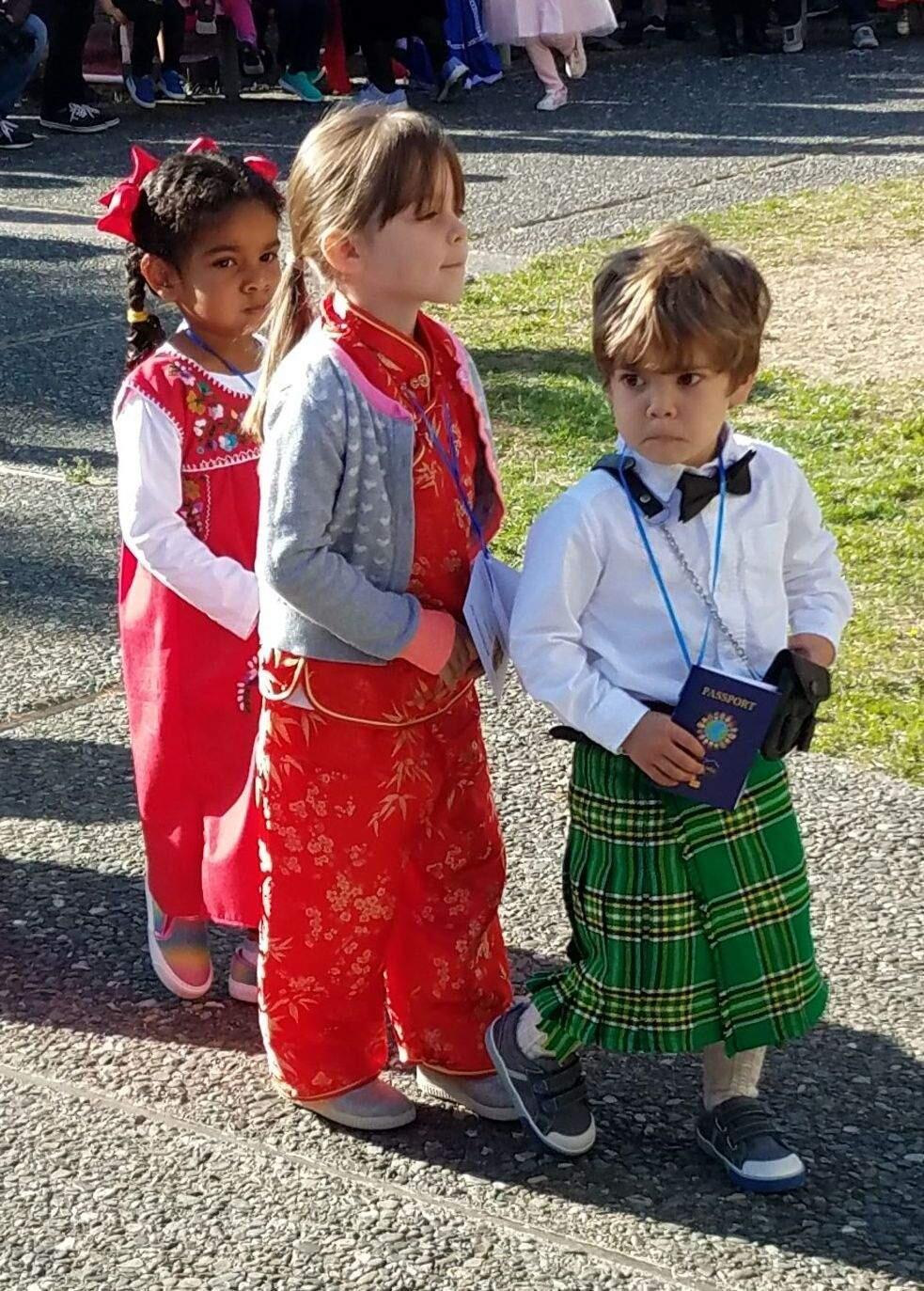 JOHN JACKSON/ARGUS-COURIER STAFFSpring Hill students were focused on their job as they paraded in the dress of the country of their heritage in the school's International Day Festival.
