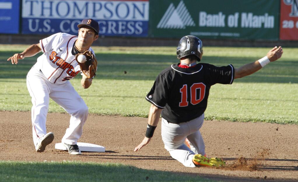 Bill Hoban/Index-TribuneSonoma Stomper Masa Miyadera waits for a throw to put the tag on Pittsburg's Javier Marticorona in Friday's game. The Stompers swept the three-grame series with the Diamonds over the weekend.