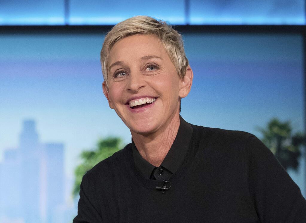 FILE - In this Oct. 13, 2016 file photo, Ellen DeGeneres appears during a commercial break at a taping of 'The Ellen Show' in Burbank, Calif. (AP Photo/Andrew Harnik, File)