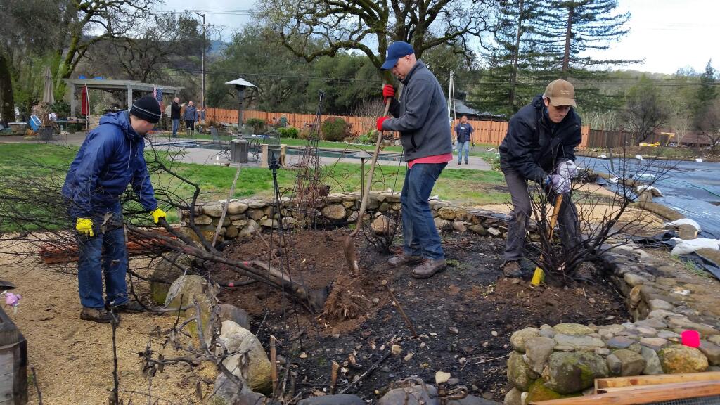 Submitted photoA dozen volunteers from the Seacoast Community Church in Encinitas spent last weekend in Glen Ellen helping members from the Glen Ellen Community Church clean up some of the lots that were burned in last fall's fires.