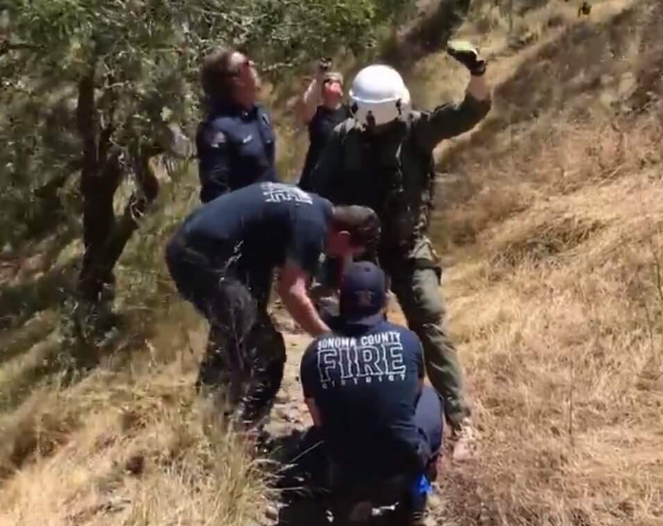 A screenshot from video posted to the Sonoma County Sheriff's Office Facebook page showing the rescue of a teen biker from Trione-Annadel State Park in Santa Rosa on Tuesday, June 18, 2019. (SONOMA COUNTY SHERIFF'S OFFICE/ FACEBOOK)