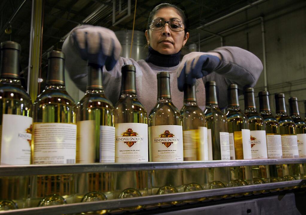Maria Carrillo works on the bottling line at Kendall-Jackson in Santa Rosa in 2007. (PD FILE)